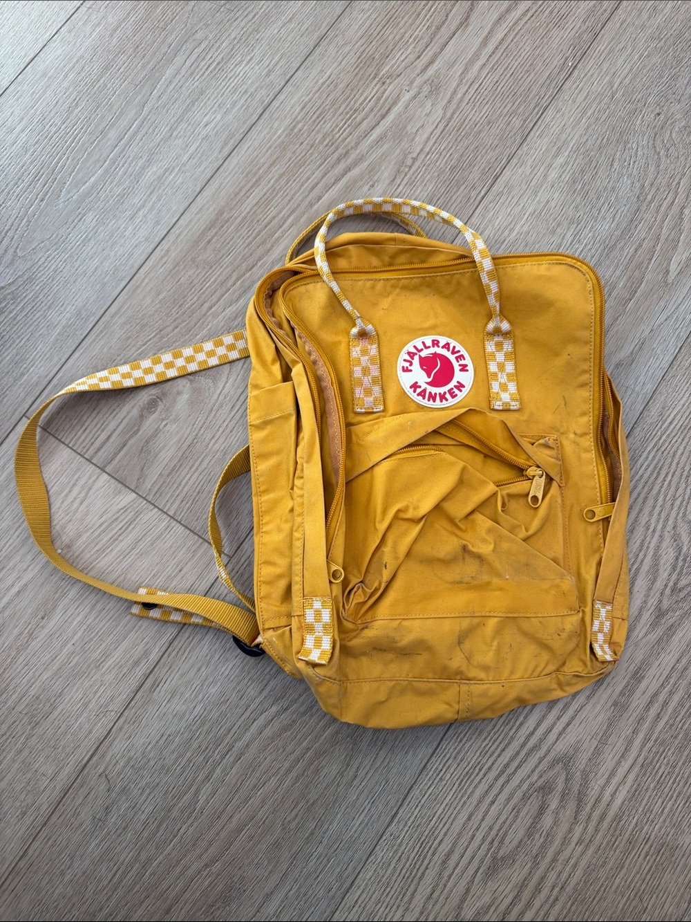 Fjallraven Kanken Backpack in Yellow with Checker Strap Detail